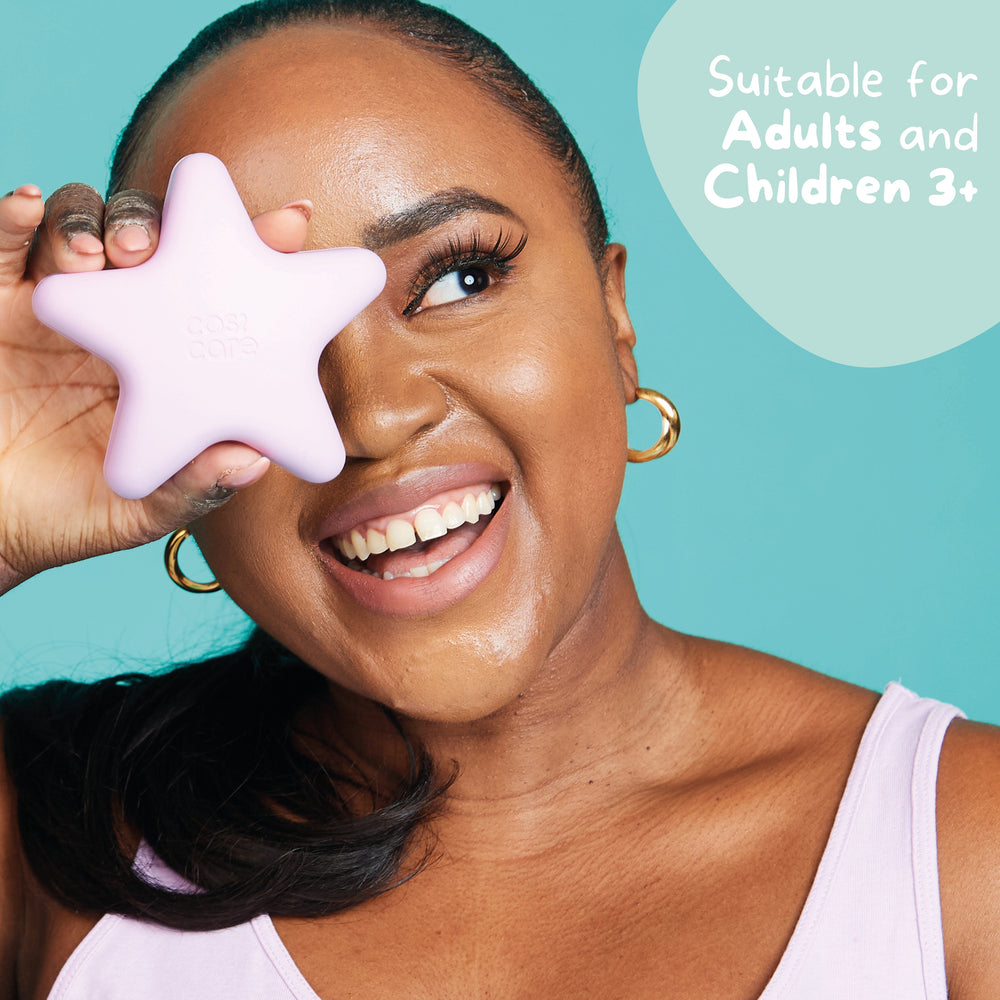 Adult holding the Scratch Star, suitable for adults and children 3 plus